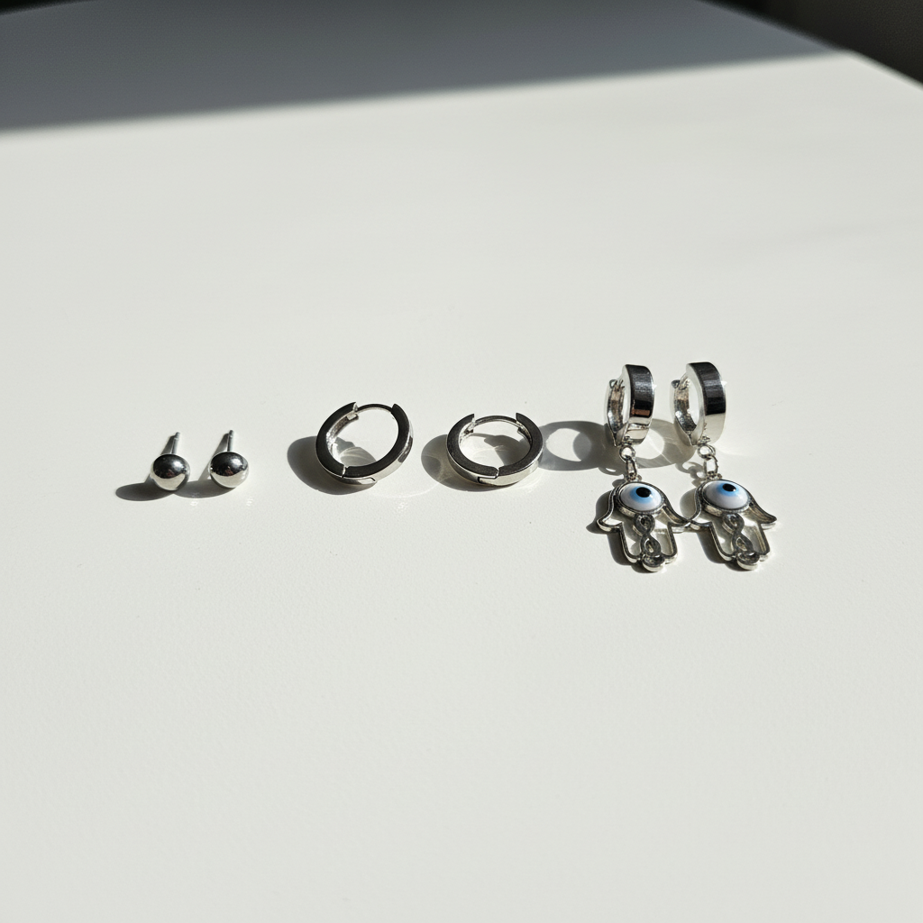 KIT 3 Brincos Prata de Aço 316L com Mão de Fátima e Olho Grego