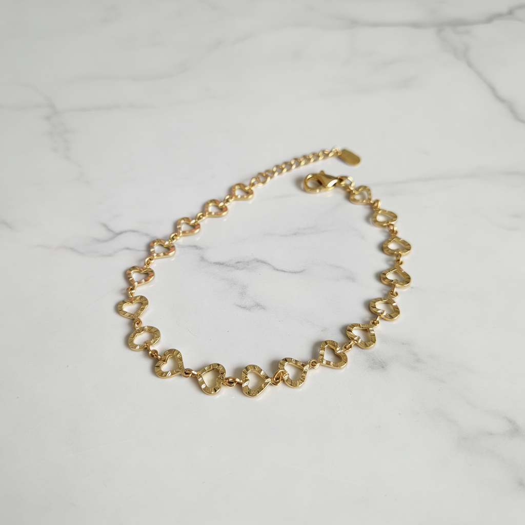 Pulseira Dourado com elos de corações trabalhados