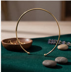 Colar Dourado Aro rígido com ponteiras de bola