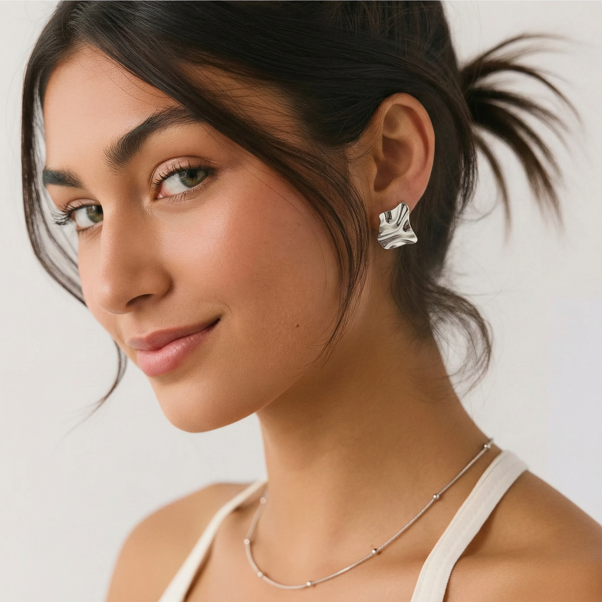 Brinco Prateado ondulado em aço inoxidável 316L