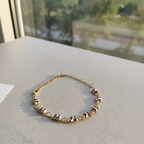 Pulseira Dourado com borboletas lilás
