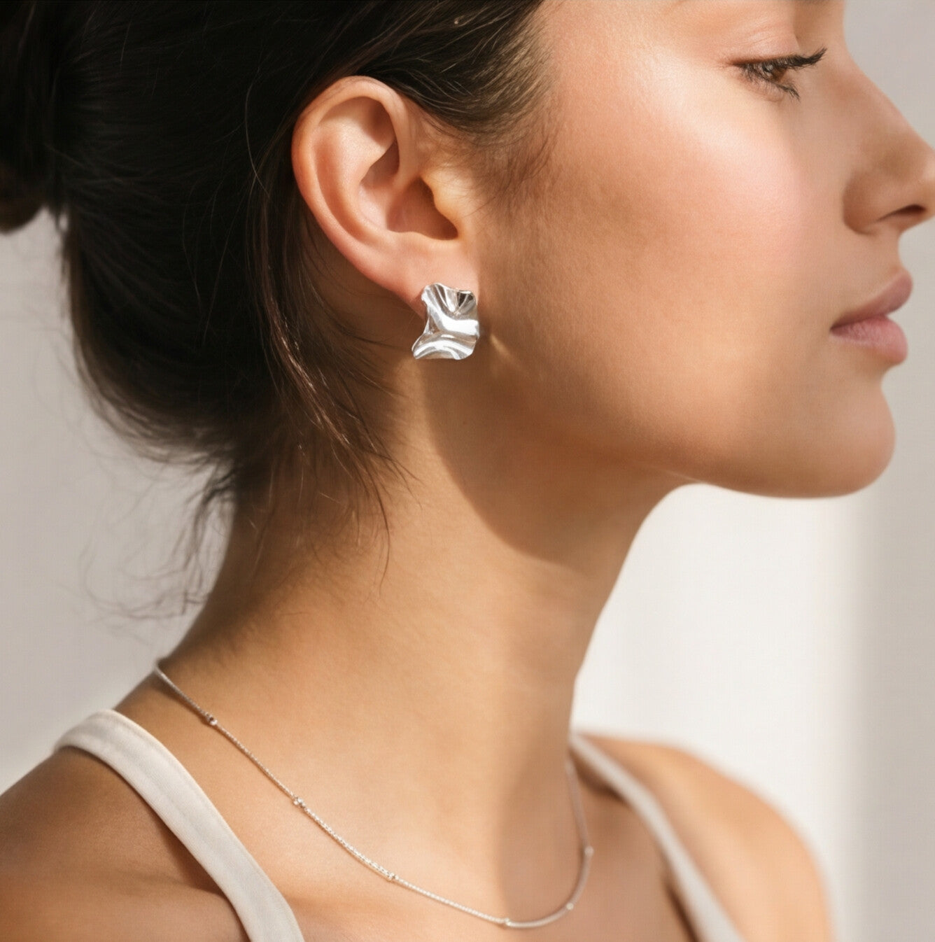 Brinco Prateado ondulado em aço inoxidável 316L