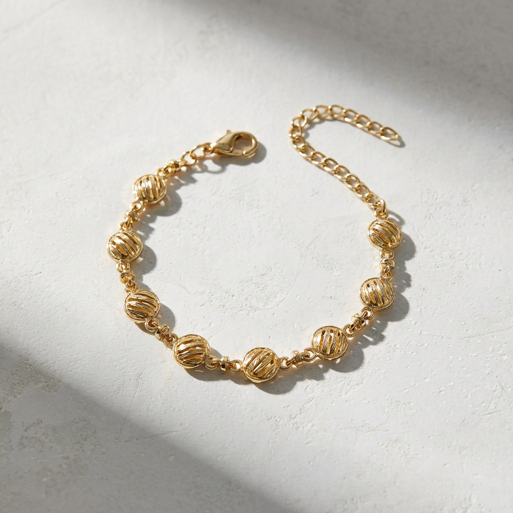 Pulseira Dourada com elos redondos trabalhados
